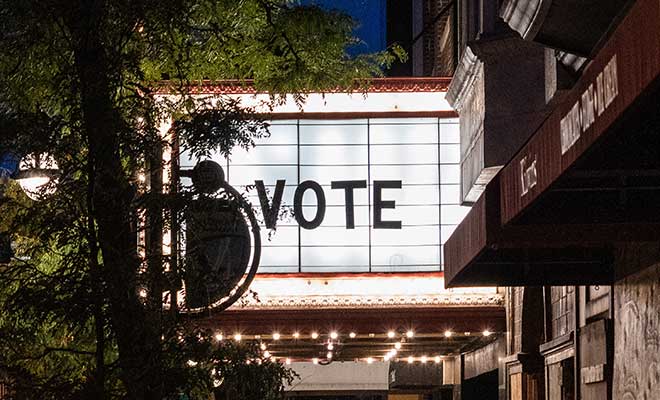 Photo of a marquee with the word "vote"