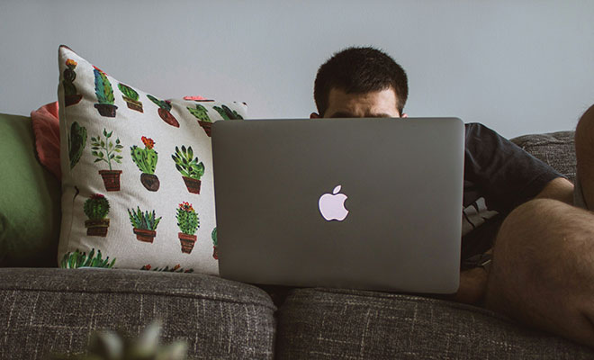 Photo of a person at a laptop